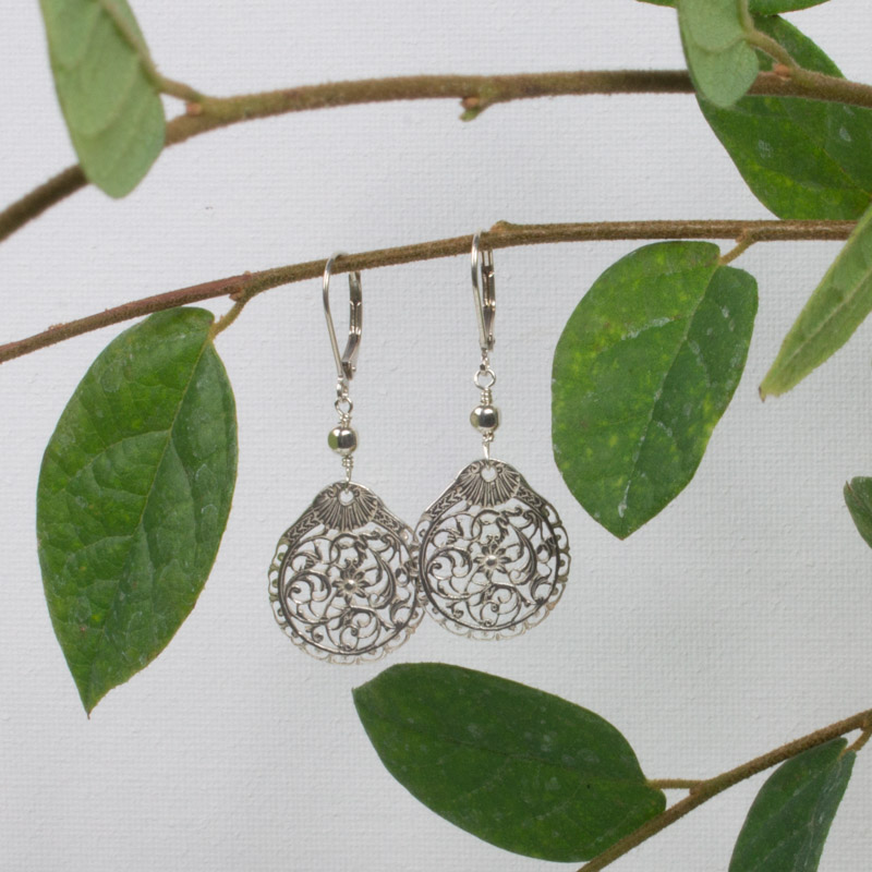 intricate design sterling silver earrings flat and lightweight