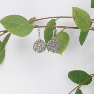 Earrings-small sterling silver disks with tree of life with heart leaves