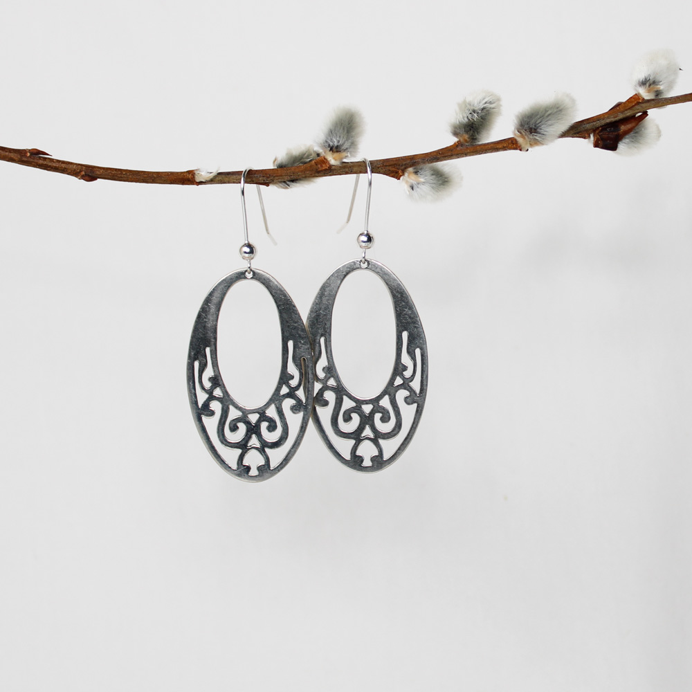 large oval open silver earrings with scroll design