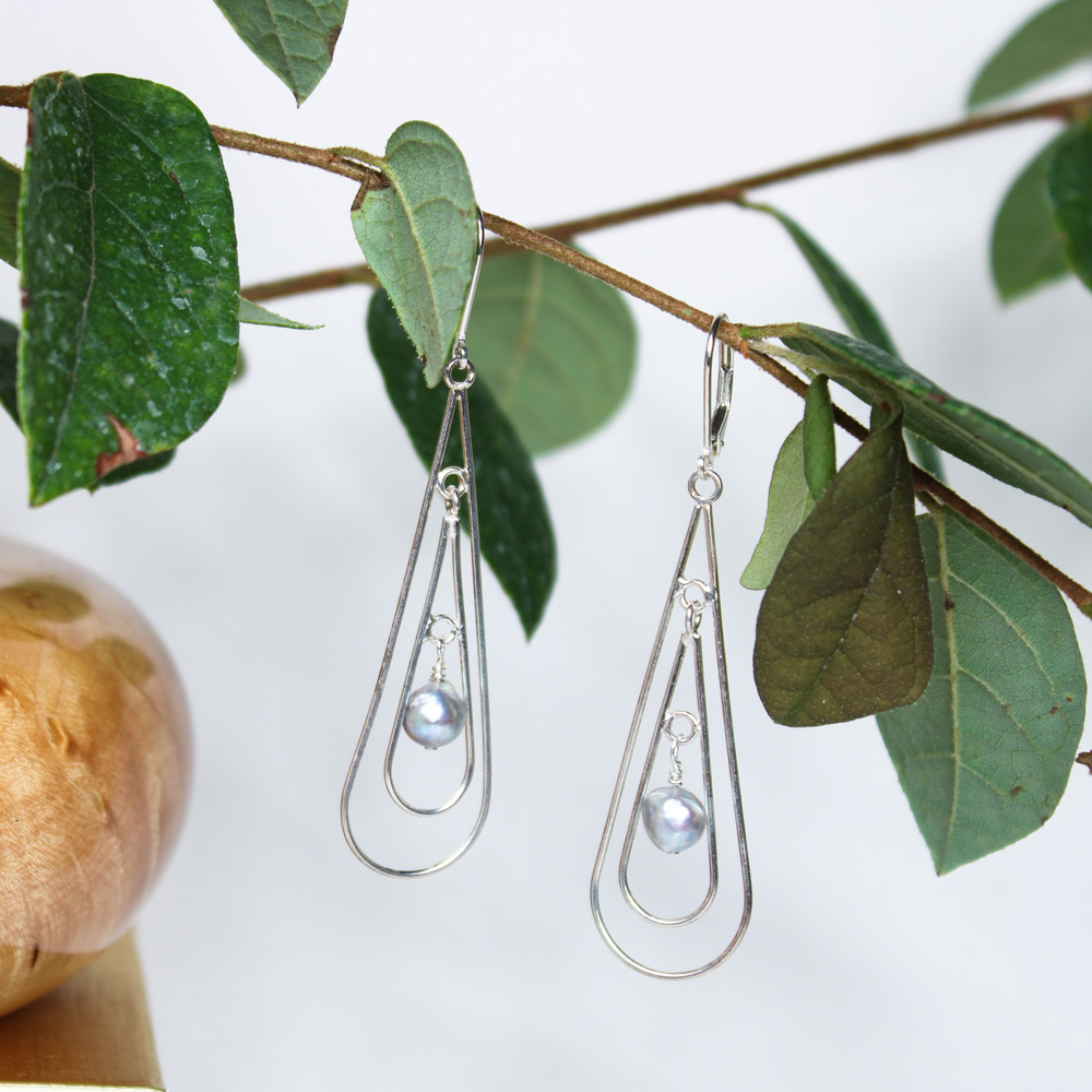 long teardrop shaped sterling silver earrings, inner part swings independently with a grey pearl drop