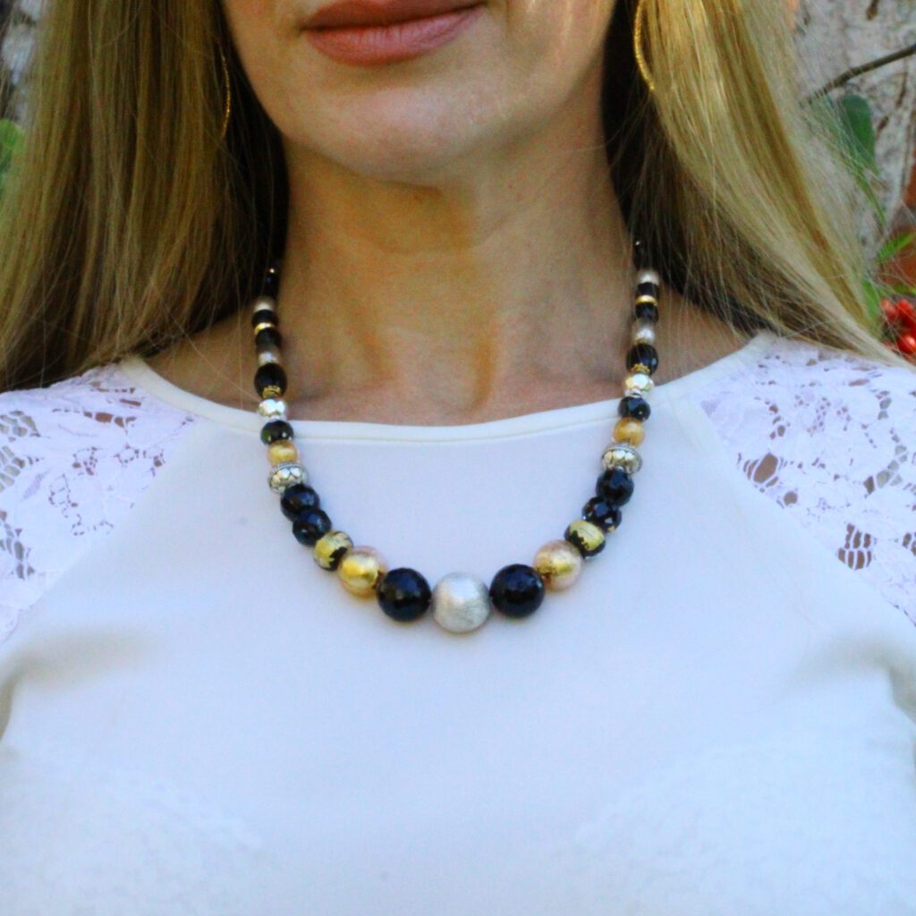 A murano glass beads in silver and black necklace