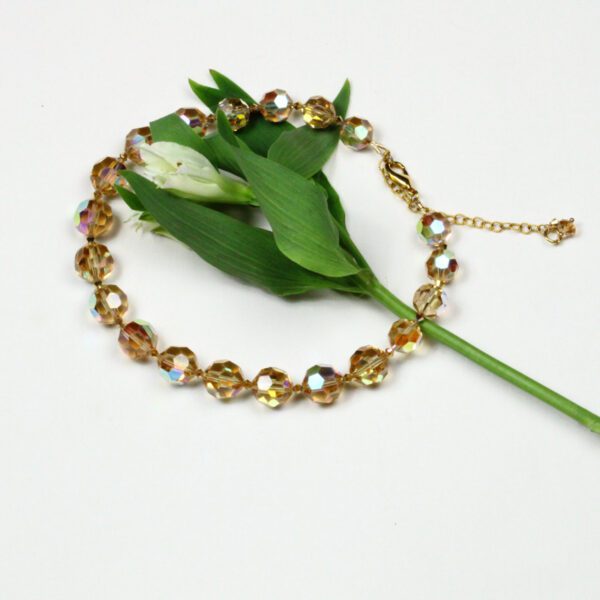 Chocker style necklace with Gold Swarovski beads